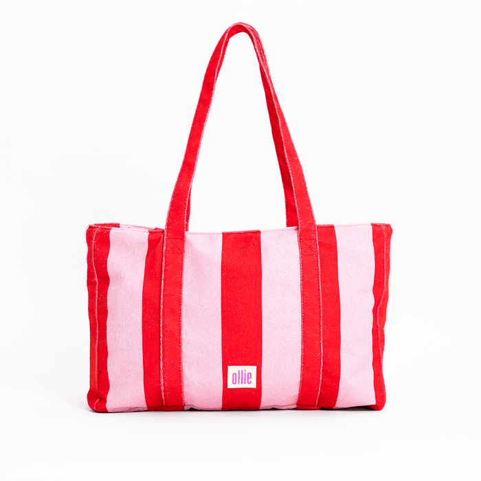Tote bag com padrão listrado de cor rosa e vermelho alaranjado de praia da Ollie em fundo branco.