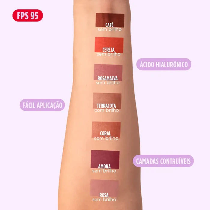Variedade de cores e tons dos Bastões 3 em 1 da Ollie, dispostos na pele